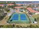 Community tennis courts and pickleball court at 460 Bouchelle Dr # 305, New Smyrna Beach, FL 32169