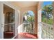 Private balcony with archway and scenic view at 460 Bouchelle Dr # 305, New Smyrna Beach, FL 32169
