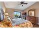Bedroom with water views and private balcony access at 460 Bouchelle Dr # 305, New Smyrna Beach, FL 32169