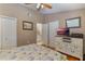 Bright bedroom with wood floors and built-in storage at 460 Bouchelle Dr # 305, New Smyrna Beach, FL 32169