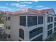 Building exterior showcasing architectural details and balconies at 460 Bouchelle Dr # 305, New Smyrna Beach, FL 32169