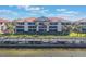 Building exterior showcasing balconies and waterfront access at 460 Bouchelle Dr # 305, New Smyrna Beach, FL 32169