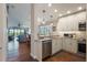 Modern kitchen with granite countertops and stainless steel appliances at 460 Bouchelle Dr # 305, New Smyrna Beach, FL 32169