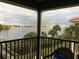 Spacious screened balcony boasting panoramic waterfront views at 460 Bouchelle Dr # 305, New Smyrna Beach, FL 32169