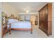 Bedroom with a king-size bed and large dresser at 4621 S Atlantic Ave # 7101, Ponce Inlet, FL 32127