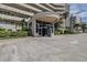 Condo building entrance with landscaping at 4621 S Atlantic Ave # 7101, Ponce Inlet, FL 32127