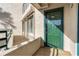 Condo entryway with green door and balcony at 4621 S Atlantic Ave # 7101, Ponce Inlet, FL 32127