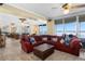 Living room with sectional sofa and ocean view at 4621 S Atlantic Ave # 7101, Ponce Inlet, FL 32127