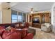 Living room with sectional sofa and entertainment center at 4621 S Atlantic Ave # 7101, Ponce Inlet, FL 32127