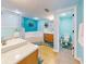Spa-like bathroom with a large soaking tub, walk-in shower, and dual vanities at 5300 S Atlantic Ave # 1-203, New Smyrna Beach, FL 32169
