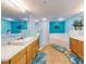 Bathroom with walk-in shower, soaking tub, and double sinks at 5300 S Atlantic Ave # 1-203, New Smyrna Beach, FL 32169