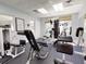Well-equipped fitness center with various weight machines at 5300 S Atlantic Ave # 1-203, New Smyrna Beach, FL 32169