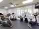 Fitness center with cardio equipment and large windows at 5300 S Atlantic Ave # 1-203, New Smyrna Beach, FL 32169