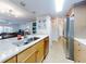 Kitchen with stainless steel appliances and light wood cabinets at 5300 S Atlantic Ave # 1-203, New Smyrna Beach, FL 32169
