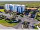 Aerial view of oceanfront community, showing building and landscaping at 5300 S Atlantic Ave # 17-506, New Smyrna Beach, FL 32169