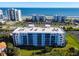 Aerial view of building, showcasing ocean views and surrounding area at 5300 S Atlantic Ave # 17-506, New Smyrna Beach, FL 32169