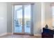 Private balcony with outdoor seating and scenic view at 5300 S Atlantic Ave # 17-506, New Smyrna Beach, FL 32169