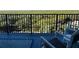 Relaxing balcony with preserve views and patio furniture at 5300 S Atlantic Ave # 17-506, New Smyrna Beach, FL 32169