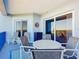 Private balcony with outdoor seating and scenic nature views at 5300 S Atlantic Ave # 17-506, New Smyrna Beach, FL 32169