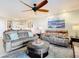 Spacious living room with comfortable seating and large windows at 5300 S Atlantic Ave # 17-506, New Smyrna Beach, FL 32169