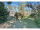 Large backyard with lush landscaping at 535 Valley Stream Dr, Geneva, FL 32732