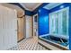 Bathroom with shower, a soaking tub, and blue walls at 535 Valley Stream Dr, Geneva, FL 32732