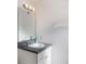 Small bathroom with vanity and mirror at 535 Valley Stream Dr, Geneva, FL 32732