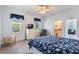 Bedroom with full bed, and access to a small bathroom at 535 Valley Stream Dr, Geneva, FL 32732