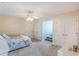 Spacious bedroom with double doors and carpet flooring at 535 Valley Stream Dr, Geneva, FL 32732