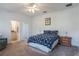 Bedroom with a full bed and ensuite bathroom at 535 Valley Stream Dr, Geneva, FL 32732