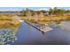 Community dock with gazebo provides scenic lake views at 535 Valley Stream Dr, Geneva, FL 32732