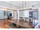 Formal dining room with a large wooden table and bench at 535 Valley Stream Dr, Geneva, FL 32732