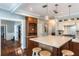 Open concept kitchen with an island and breakfast bar at 535 Valley Stream Dr, Geneva, FL 32732