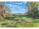 Peaceful lake view from a wooded area at 535 Valley Stream Dr, Geneva, FL 32732