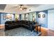 Spacious living room featuring a large sectional sofa and hardwood floors at 535 Valley Stream Dr, Geneva, FL 32732