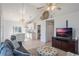 Open living room with kitchen and vaulted ceiling at 535 Valley Stream Dr, Geneva, FL 32732
