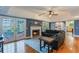 Comfortable living room with fireplace and access to backyard at 535 Valley Stream Dr, Geneva, FL 32732