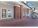 Brick patio with seating area and access to the interior at 535 Valley Stream Dr, Geneva, FL 32732