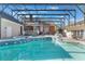 Large pool and spa with screened enclosure at 535 Valley Stream Dr, Geneva, FL 32732