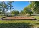 swings set in a grassy area of a park at 535 Valley Stream Dr, Geneva, FL 32732
