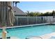 Inviting community pool with a surrounding fence at 537 Coral Trace Blvd, Edgewater, FL 32132