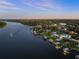 Aerial perspective showcasing the home's waterfront location at 73 Cunningham Dr, New Smyrna Beach, FL 32168