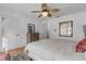 Spacious bedroom with a dresser and large mirror at 101 N Pine St # 7, New Smyrna Beach, FL 32169