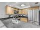 Modern kitchen with stainless steel appliances and granite counters at 101 N Pine St # 7, New Smyrna Beach, FL 32169