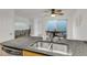 Kitchen with stainless steel appliances and double sink at 101 N Pine St # 7, New Smyrna Beach, FL 32169