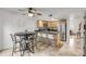 Eat-in kitchen with breakfast bar and stainless steel appliances at 101 N Pine St # 7, New Smyrna Beach, FL 32169