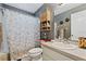 Bathroom with a shower and updated vanity at 1331 Umbrella Tree Dr, Edgewater, FL 32132