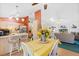 Kitchen with island, breakfast nook and view of living room at 1331 Umbrella Tree Dr, Edgewater, FL 32132