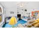 Open living area with neutral color palette, comfy couches, and a ceiling fan at 1331 Umbrella Tree Dr, Edgewater, FL 32132