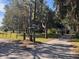 Long private driveway leading to a secluded property at 1390 Tumblin Dr, New Smyrna Beach, FL 32168